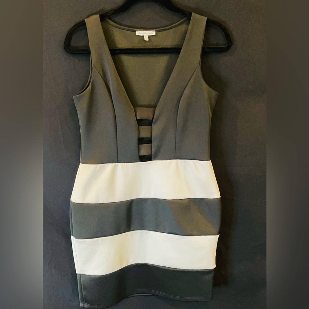 Black and white sexy mini dress. Deep cut with center slits. Size L
